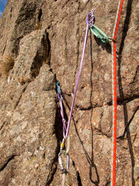 Low angle view of ropes on rock