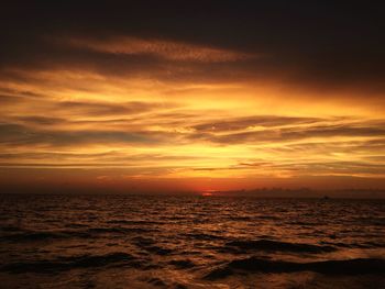 Scenic view of sea at sunset