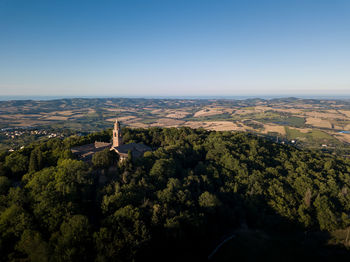 High angle view of cityscape against clear blue sky