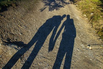 Shadow of people on wall