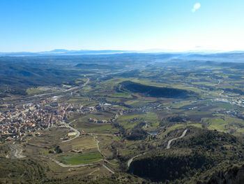 Aerial view of landscape against clear sky