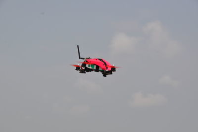 Low angle view of airplane in sky