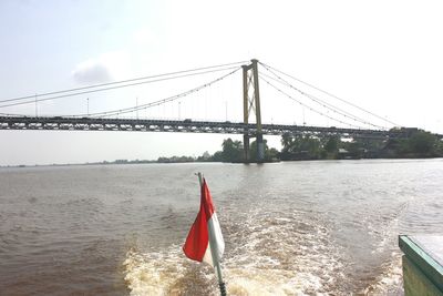 Bridge over river against sky