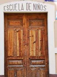 Closed wooden door of building