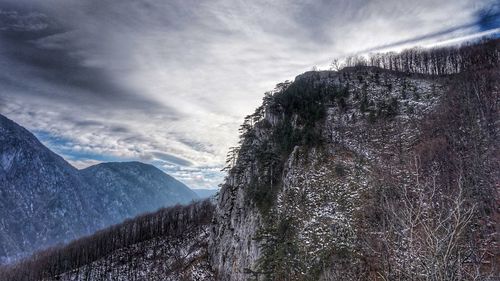 Scenic view of tree mountains against sky