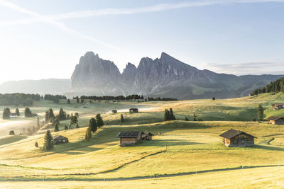 Scenic view of farm against sky