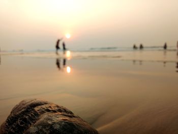 Scenic view of sea against sky at sunset