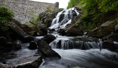 Low angle view of stream flowing