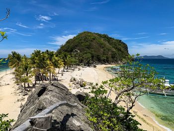 Scenic view of sea against blue sky