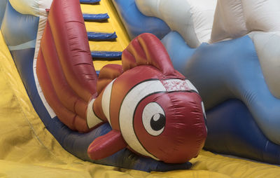 High angle view of child relaxing on bed