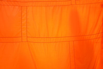 Full frame shot of orange curtain