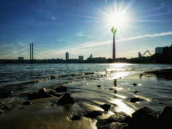 Scenic view of sea against cloudy sky