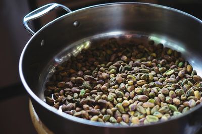 High angle view of toasted nuts in bowl