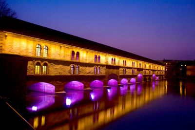 View of illuminated buildings at night