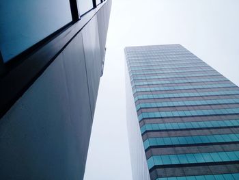 Low angle view of skyscrapers against sky