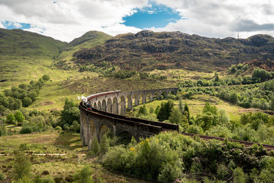 Lanscape shot of glennfinnan  viaduct and surrounding scenery 