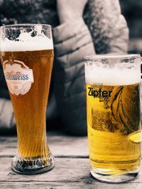 Close-up of beer glass on table