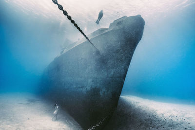 Abandoned boat in sea