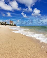 Scenic view of beach against sky