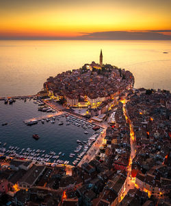High angle view of city at sunset