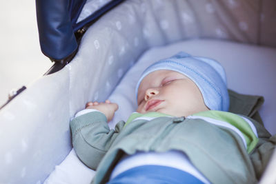 Cute baby sleeping in bed