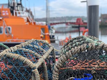 Stack of fishing net at harbor