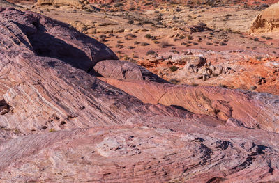 Purple, pink and yellow rock formations at valley of fire state park in nevada