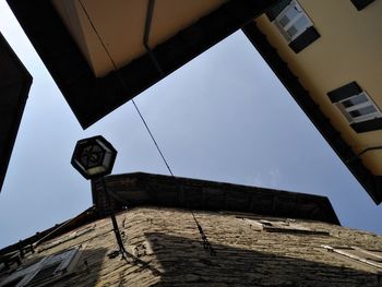 Low angle view of old building against clear sky