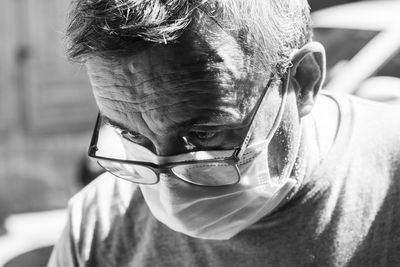 Close-up portrait of boy wearing mask