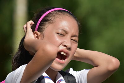 Cute angry girl outdoors