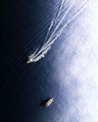 Low angle view of airplane flying against sky