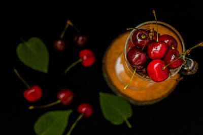 High angle view of cherries on plant