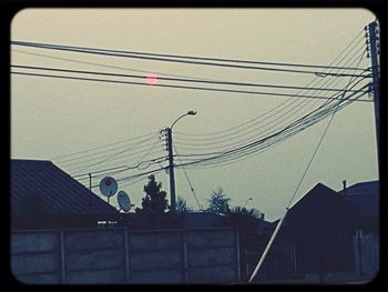 Low angle view of electricity pylon