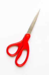 High angle view of red chili peppers against white background