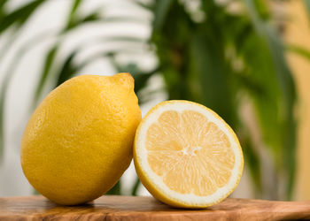 Close-up of a whole and a half lemon
