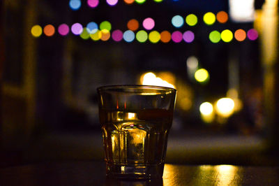 Close-up of beer glass on table