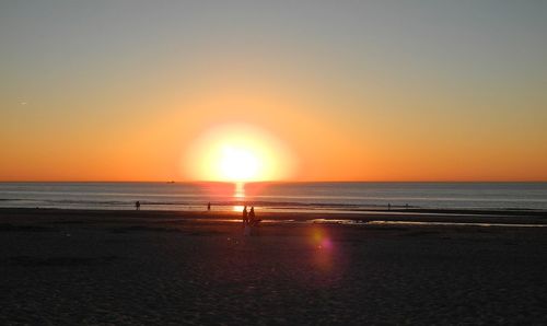 Scenic view of beach during sunset