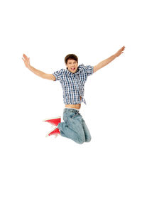 Low angle view of person jumping against white background