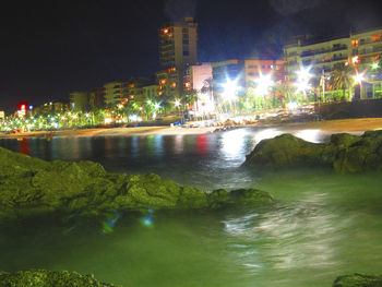 View of illuminated city at night