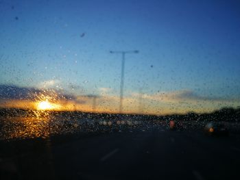 Raindrops on glass window during rainy season
