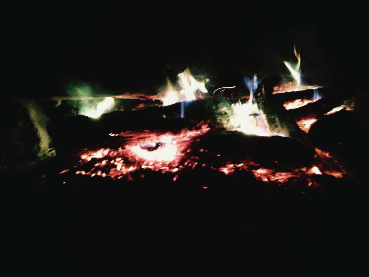 burning, flame, fire - natural phenomenon, night, heat - temperature, glowing, bonfire, illuminated, fire, dark, light - natural phenomenon, firewood, indoors, campfire, heat, close-up, motion, long exposure, no people, smoke - physical structure