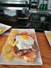 Close-up of breakfast served on table