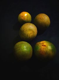 Close-up of apples on black background