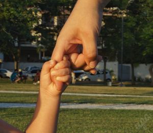 Midsection of man holding hands