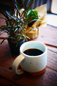 Close-up of coffee cup on table