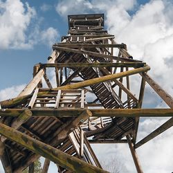 Low angle view of metallic structure against sky