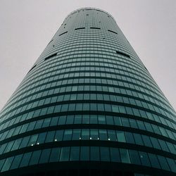 Low angle view of modern building against sky