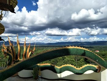 Plants growing on field against sky