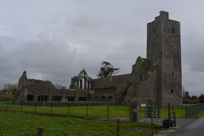 Castle against cloudy sky