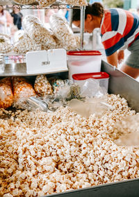 Popping and selling kettle corn at the farmers market.